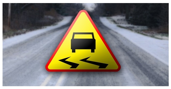 oblodzona droga znak informujacy